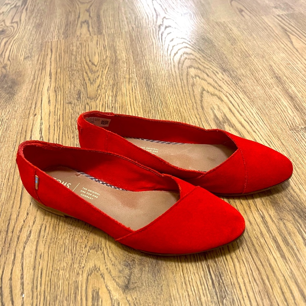 Red TOMS suede flats, size 6.5